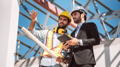 civil-engineer-construction-worker-manager-holding-digital-tablet-blueprints-talking-planing-about-construction-site-cooperation-teamwork-concept Civil engineer and construction worker manager holding digital tablet and blueprints , talking and planing about construction site. Cooperation teamwork concept.